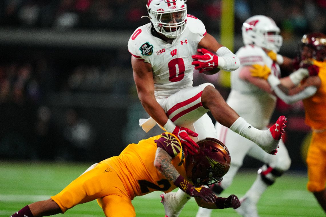 Wisconsin Outlast Short-Handed Arizona State to Win Las Vegas Bowl